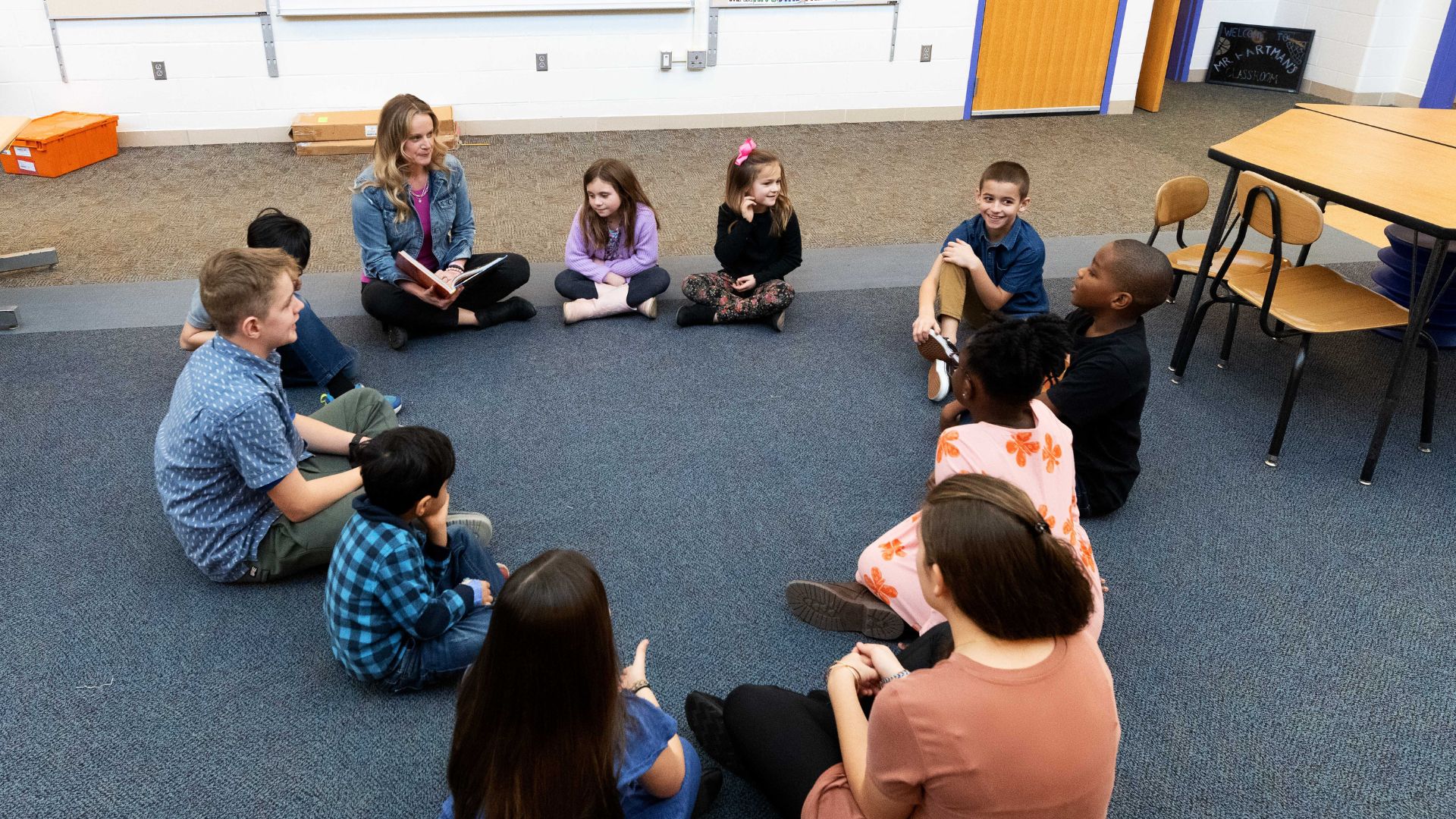 group of kids siting in circle