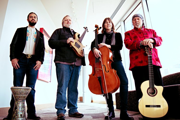 left to right, pictured with their instruments: Leo Corona, percussion; Randy Hoepker, bass; Dianne Betkowski (cello) and Miguel Espinoza (guitar)