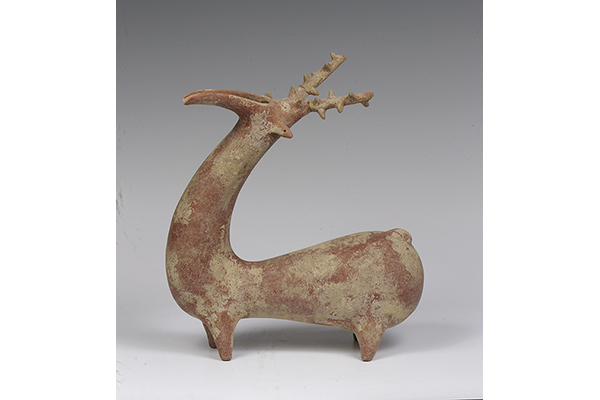 Ceramic rhyton in the shape of a horned animal