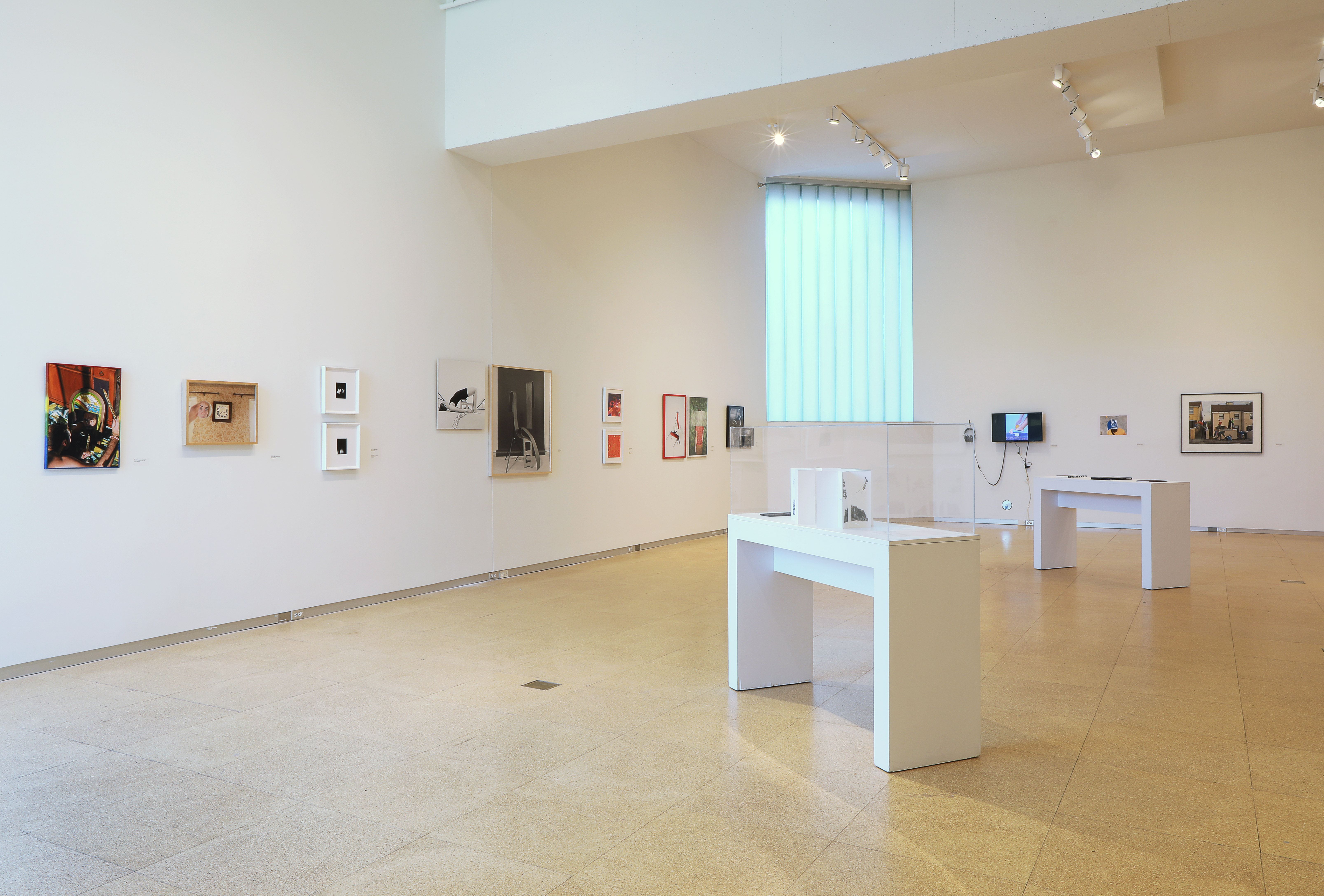Installation view of photographs from the 2022 National Photography Invitational
