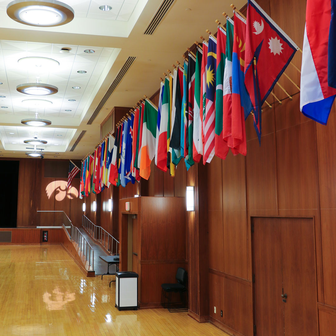 international flags displayed on along wall
