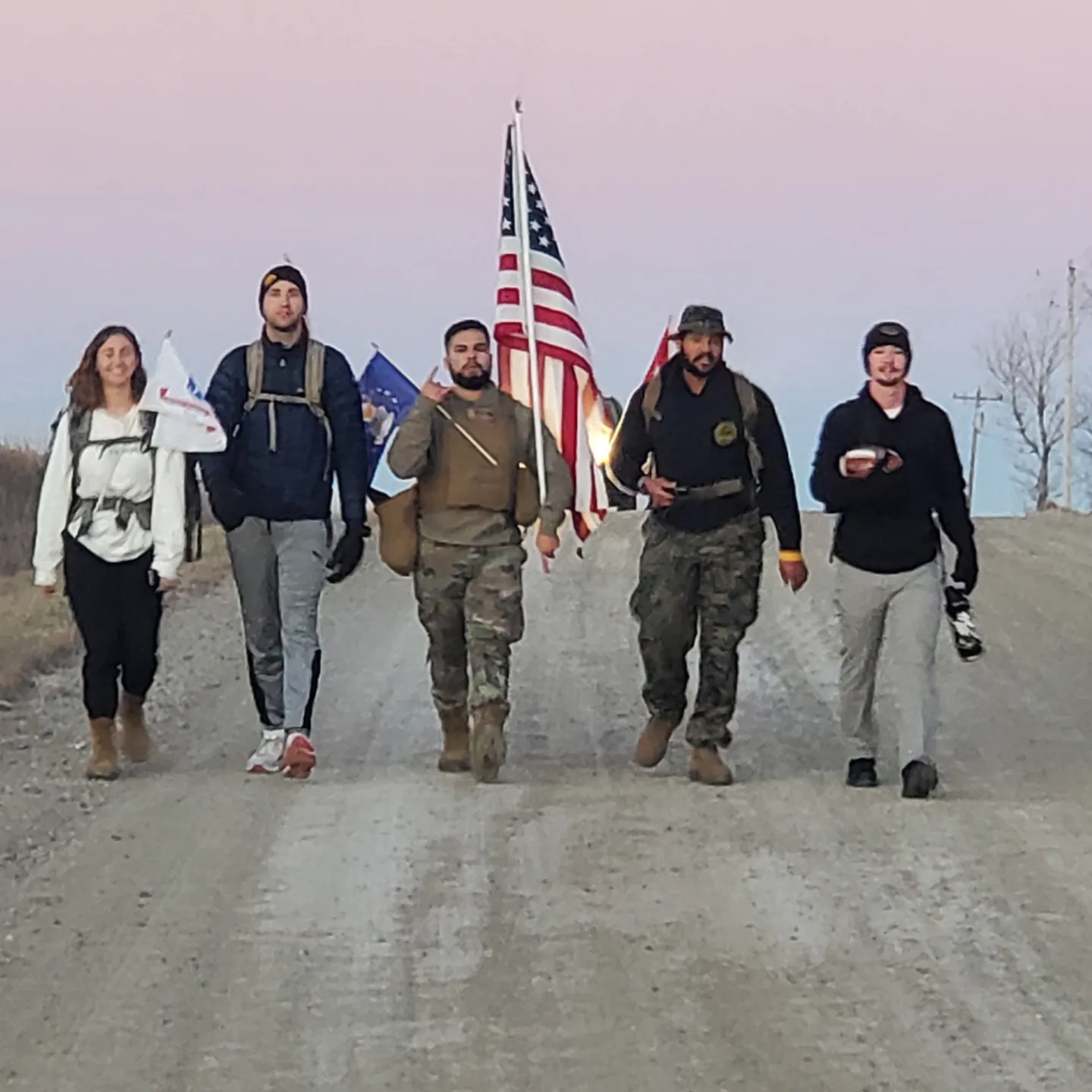 Student Veterans carrying the American flag