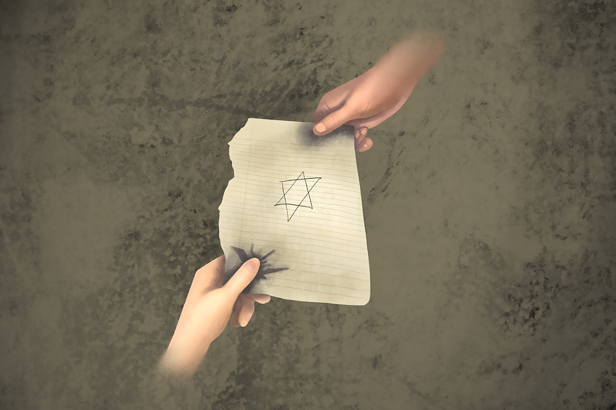 One hand passing a piece of paper with the Star of David drawn on it to another hand.