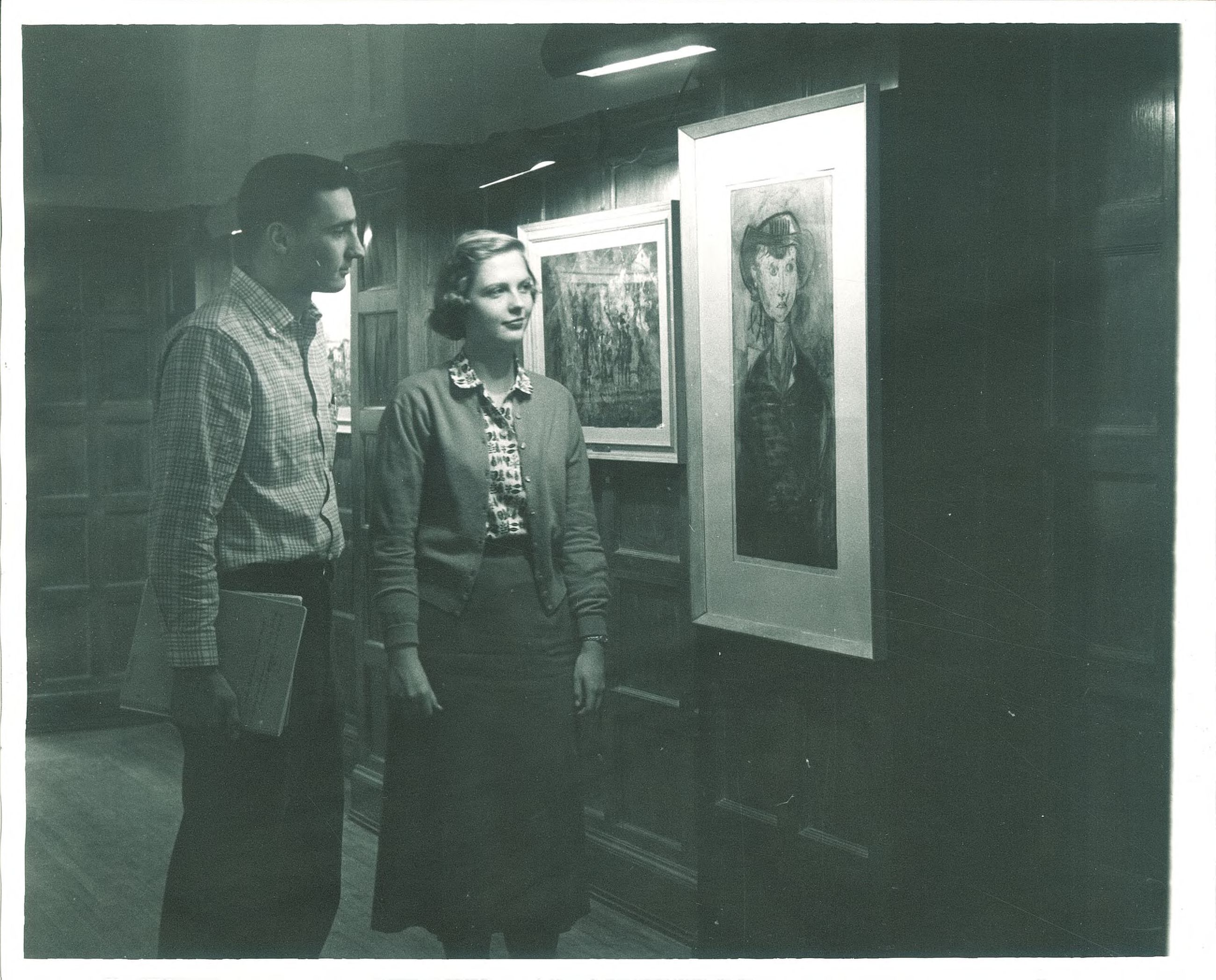 Couple in front of painting in IMU