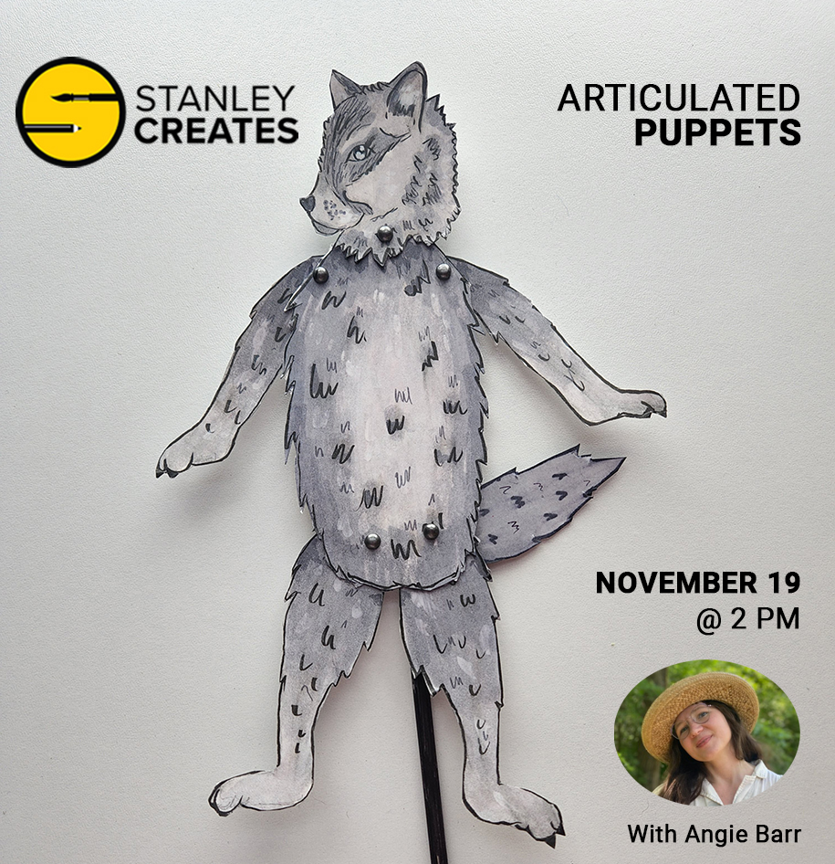 A paper wolf puppet made with hinged legs